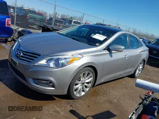 2013 Hyundai Azera with VIN KMHFH4JG3DA220430, listed as a IAAI auction lot 41805191 with 101,610 mi miles and . Bid and sale history available at DreamBid. Image 2.
