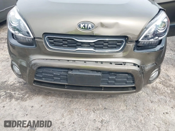 2012 Kia Soul + with VIN KNDJT2A62C7465580, listed as a IAAI auction lot 41717664 with 70,699 mi miles. Bid and sale history available at carsss.com. Image 6.