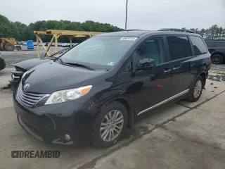 2016 Toyota Sienna XLE with VIN 5TDYK3DC2GS757606, listed as a Copart auction lot 60629795 with 68,695 mi miles and Salvage title. Bid and sale history available at DreamBid. Image 1.