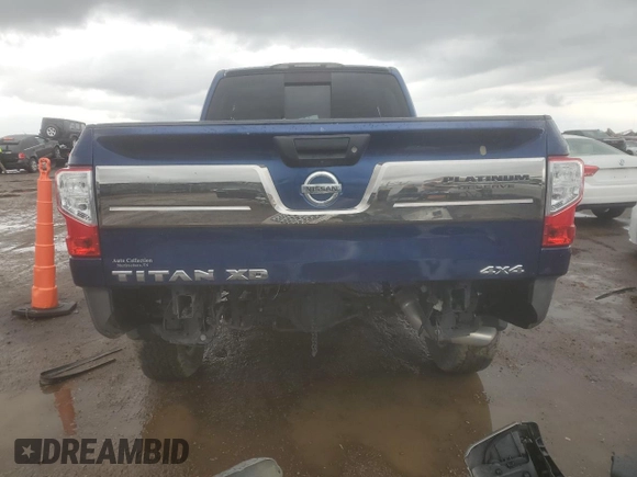 2017 Nissan Titan Platinum Reserve z VIN 1N6BA1F40HN569996, wystawiony jako Copart lot #55887505 z przebiegiem 93 488 mil mil oraz Szkoda całkowita • Salvage title. Historia ofert i sprzedaży dostępna na DreamBid. Obrazek 6.