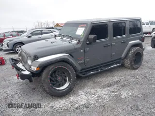 2019 Jeep Wrangler Unlimited Sahara with VIN 1C4HJXEG8KW533339, listed as a IAAI auction lot 40963653 with 69,202 mi miles and . Bid and sale history available at DreamBid. Image 17.