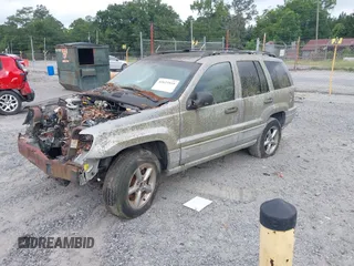 2000 Jeep Grand Cherokee Laredo z VIN 1J4G248N2YC334566, wystawiony jako IAAI lot #42623519 z przebiegiem Nie podano mil oraz . Historia ofert i sprzedaży dostępna na DreamBid. Obrazek 2.