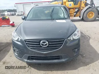 2016 Mazda CX-5 Grand Touring with VIN JM3KE4DY9G0845707, listed as a IAAI auction lot 41709685 with 96,351 mi miles. Bid and sale history available at carsss.com. Image 12.