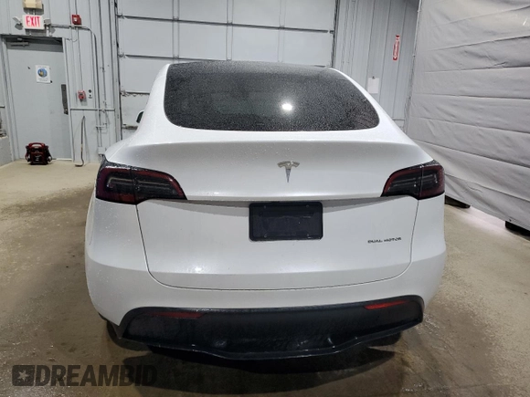 2024 Tesla Model Y Long Range с VIN 7SAYGDEE8RA266519, выставлен на аукционе Copart как лот 60899095 с пробегом Не указан миль и Списание • Salvage title. История ставок и продаж доступна на DreamBid. Изображение 6.