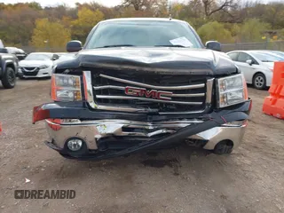 2012 GMC Sierra 1500 SLT z VIN 1GTR2WE71CZ337710, wystawiony jako IAAI lot #40658228 z przebiegiem 105 781 mil mil oraz . Historia ofert i sprzedaży dostępna na DreamBid. Obrazek 12.