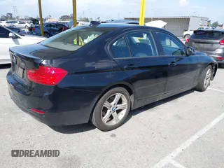 2014 BMW 3 Series 328i with VIN WBA3C1C50EK107365, listed as a IAAI auction lot 41959537 with 161,749 mi miles. Bid and sale history available at carsss.com. Image 4.