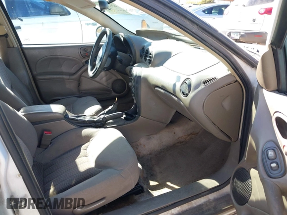 2005 Pontiac Grand Am SE with VIN 1G2NE52E05M215976, listed as a IAAI auction lot 42025657 with 220,418 mi miles. Bid and sale history available at carsss.com. Image 5.