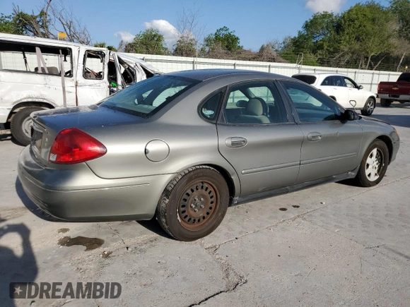 2003 Ford Taurus LX Standard with VIN 1FAFP52U13G243207, listed as a Copart auction lot 52763905 with 49,906 mi miles and Salvage title. Bid and sale history available at DreamBid. Image 3.