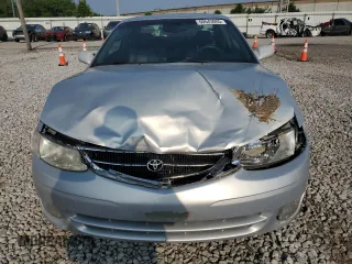 2000 Toyota Solara SE z VIN 2T1CF28P5YC267645, wystawiony jako Copart lot #60543605 z przebiegiem 58 938 mil mil oraz Szkoda całkowita • Salvage title. Historia ofert i sprzedaży dostępna na DreamBid. Obrazek 5.