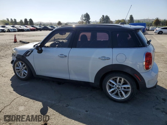 2014 MINI Countryman S with VIN WMWZC3C5XEWP25792, listed as a Copart auction lot 58583455 with 83,831 mi miles and Salvage title. Bid and sale history available at DreamBid. Image 2.