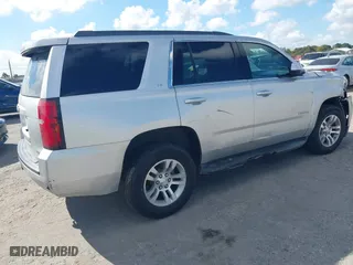 2017 Chevrolet Tahoe LT with VIN 1GNSCBKC6HR233401, listed as a IAAI auction lot 41544529 with 107,796 mi miles. Bid and sale history available at carsss.com. Image 4.