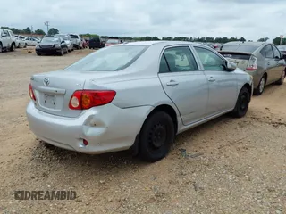 2009 Toyota Corolla with VIN 1NXBU40E49Z086415, listed as a IAAI auction lot 39773955 with 203,803 mi miles and . Bid and sale history available at DreamBid. Image 4.