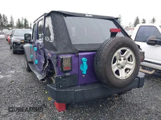 2018 Jeep Wrangler JK Unlimited Sport S with VIN 1C4BJWDG0JL847049, listed as a IAAI auction lot 41218525 with 90,588 mi miles. Bid and sale history available at carsss.com. Image 3.