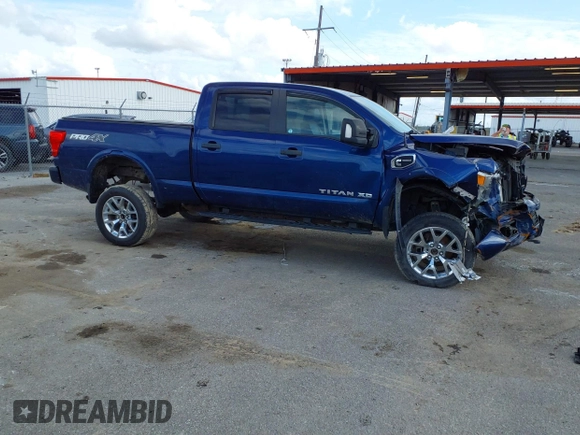 2017 Nissan Titan Pro-4X z VIN 1N6BA1F45HN519305, wystawiony jako IAAI lot #41689197 z przebiegiem 116 562 mil mil oraz . Historia ofert i sprzedaży dostępna na DreamBid. Obrazek 13.