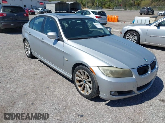 2011 BMW 3 Series 328i with VIN WBAPH7G57BNM57845, listed as a IAAI auction lot 41803365 with 243,952 mi miles. Bid and sale history available at carsss.com. Image 1.