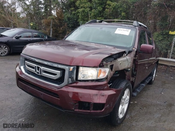 2009 Honda Ridgeline RTL with VIN 5FPYK16559B103698, listed as a IAAI auction lot 41479390 with 144,554 mi miles. Bid and sale history available at carsss.com. Image 2.