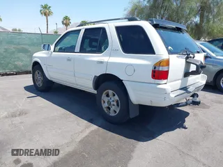 1999 Isuzu Rodeo S with VIN 4S2CK58W7X4325703, listed as a IAAI auction lot 42715480 with 205,420 mi miles and . Bid and sale history available at DreamBid. Image 3.