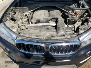 2014 BMW X5 xDrive35i with VIN 5UXKR0C51E0K51458, listed as a Copart auction lot 48675285 with 125,553 mi miles and Salvage Title. Bid and sale history available at carsss.com. Image 13.