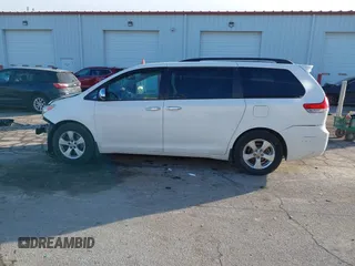 2014 Toyota Sienna LE AAS with VIN 5TDKK3DC2ES483679, listed as a IAAI auction lot 41547261 with 142,697 mi miles. Bid and sale history available at carsss.com. Image 15.