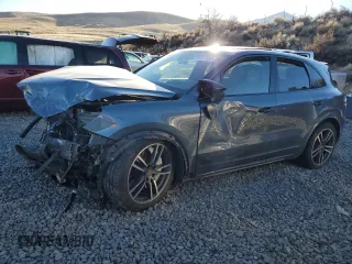 2020 Porsche Cayenne Turbo z VIN WP1AF2AY4LDA39303, wystawiony jako Copart lot #87977605 z przebiegiem Nie podano mil oraz Szkoda całkowita • Salvage title. Historia ofert i sprzedaży dostępna na DreamBid. Obrazek 1.