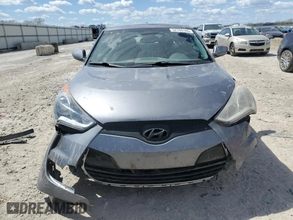 2014 Hyundai Veloster z VIN KMHTC6AD3EU215750, wystawiony jako Copart lot #52769165 z przebiegiem 114 364 mil mil oraz Szkoda całkowita • Salvage title. Historia ofert i sprzedaży dostępna na DreamBid. Obrazek 5.