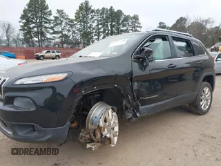 2014 Jeep Cherokee Limited with VIN 1C4PJLDSXEW279356, listed as a IAAI auction lot 41533158 with 115,117 mi miles. Bid and sale history available at carsss.com. Image 6.