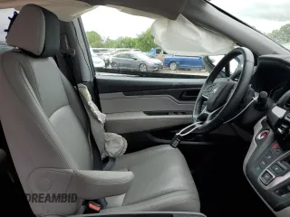 2022 Honda Odyssey EX-L z VIN 5FNRL6H75NB034219, wystawiony jako Copart lot #58112845 z przebiegiem 48 530 mil mil oraz Szkoda całkowita • Salvage title. Historia ofert i sprzedaży dostępna na DreamBid. Obrazek 7.
