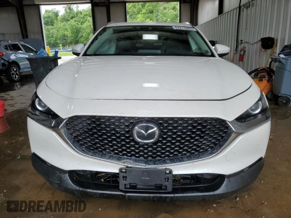 2023 Mazda CX-30 S Select z VIN 3MVDMBBM2PM521471, wystawiony jako Copart lot #63272965 z przebiegiem 26 879 mil mil oraz Szkoda całkowita • Salvage title. Historia ofert i sprzedaży dostępna na DreamBid. Obrazek 5.