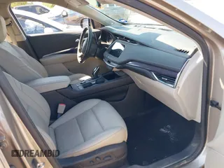 2023 Cadillac XT4 FWD Luxury with VIN 1GYAZAR4XPF116698, listed as a IAAI auction lot 40594015 with 18,368 mi miles. Bid and sale history available at carsss.com. Image 5.