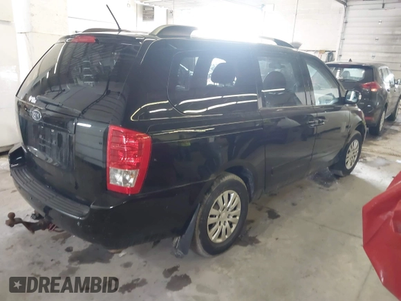 2012 Kia Sedona LX with VIN KNDMG4C78C6435430, listed as a IAAI auction lot 41701890 with 170,128 mi miles. Bid and sale history available at carsss.com. Image 4.