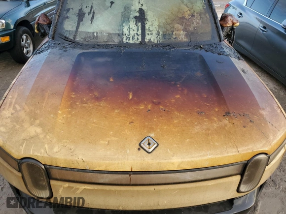 2023 Rivian R1T Adventure z VIN 7FCTGBAA6PN028517, wystawiony jako Copart lot #73712354 z przebiegiem Nie podano mil oraz Nie do naprawy. Historia ofert i sprzedaży dostępna na DreamBid. Obrazek 12.