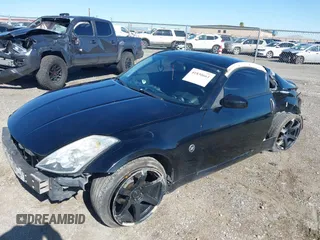2004 Nissan 350Z Touring with VIN JN1AZ34D94M102990, listed as a IAAI auction lot 41830661 with 107,520 mi miles. Bid and sale history available at carsss.com. Image 2.