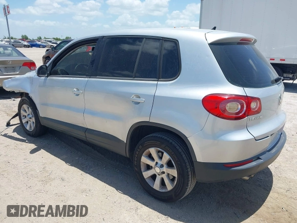 2010 Volkswagen Tiguan S with VIN WVGAV7AX5AW002380, listed as a IAAI auction lot 42604662 with 124,841 mi miles and . Bid and sale history available at DreamBid. Image 3.