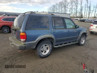 1999 Ford Explorer XL with VIN 1FMDU32E7XUC25465, listed as a Copart auction lot 83651354 with 93,850 mi miles and Clean title. Bid and sale history available at DreamBid. Image 3.