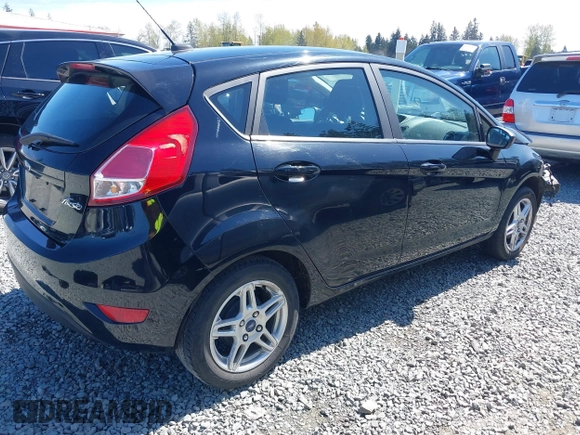 2019 Ford Fiesta SE with VIN 3FADP4EJ1KM155491, listed as a IAAI auction lot 42041050 with 72,381 mi miles. Bid and sale history available at carsss.com. Image 4.