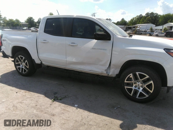 2023 Chevrolet Colorado 4WD Z71 with VIN 1GCPTDEK4P1249624, listed as a IAAI auction lot 42130950 with 9,795 mi miles and . Bid and sale history available at DreamBid. Image 6.