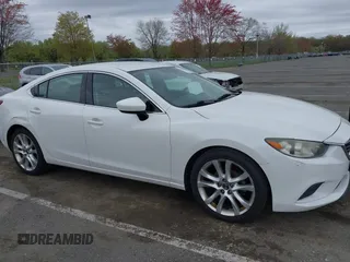 2014 Mazda 6 i Touring with VIN JM1GJ1V59E1109421, listed as a IAAI auction lot 42094480 with 153,287 mi miles. Bid and sale history available at carsss.com. Image 17.