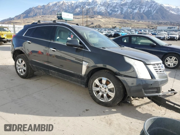 2015 Cadillac SRX Luxury Collection with VIN 3GYFNEE34FS619157, listed as a Copart auction lot 48331665 with 130,477 mi miles and Salvage Title. Bid and sale history available at DreamBid. Image 4.