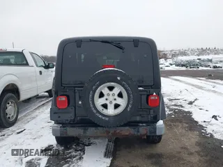 2005 Jeep Wrangler X with VIN 1J4FA39S55P353131, listed as a IAAI auction lot 41575949 with 154,026 mi miles and . Bid and sale history available at DreamBid. Image 16.