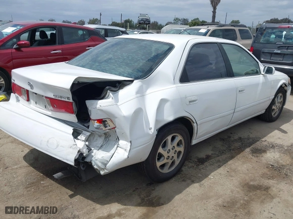 2000 Toyota Camry CE with VIN JT2BG22K3Y0406082, listed as a IAAI auction lot 42053116 with 171,219 mi miles. Bid and sale history available at carsss.com. Image 4.