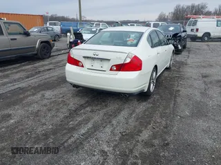 2007 Infiniti M45 Sdn with VIN JNKBY01E57M401878, listed as a IAAI auction lot 41518784 with 84,309 mi miles. Bid and sale history available at carsss.com. Image 4.