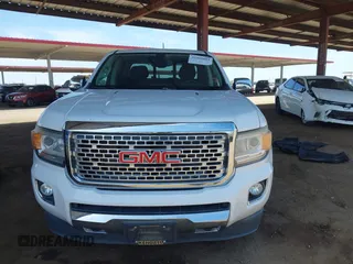 2018 GMC Canyon 4WD Denali z VIN 1GTP6EE11J1178961, wystawiony jako IAAI lot #42499884 z przebiegiem 71 309 mil mil oraz . Historia ofert i sprzedaży dostępna na DreamBid. Obrazek 12.