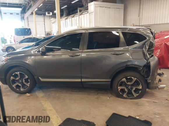 2018 Honda CR-V Touring with VIN 2HKRW2H91JH634457, listed as a IAAI auction lot 41697658 with 101,878 mi miles. Bid and sale history available at carsss.com. Image 15.