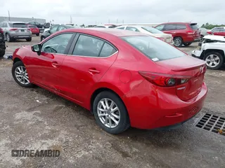 2014 Mazda 3 i Touring z VIN JM1BM1V75E1148848, wystawiony jako IAAI lot #42200934 z przebiegiem 134 176 mil mil oraz . Historia ofert i sprzedaży dostępna na DreamBid. Obrazek 3.