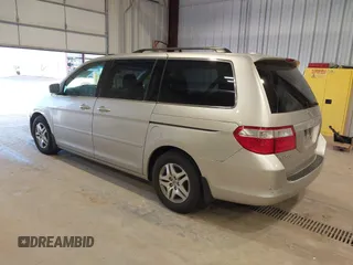 2006 Honda Odyssey EX-L with VIN 5FNRL387X6B449343, listed as a IAAI auction lot 42162759 with 242,590 mi miles. Bid and sale history available at carsss.com. Image 3.