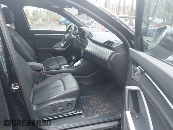 2021 Audi Q3 Premium with VIN WA1AUCF34M1148531, listed as a IAAI auction lot 41815286 with 31,934 mi miles and . Bid and sale history available at DreamBid. Image 5.