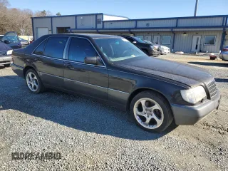 1993 Mercedes-Benz 400 z VIN WDBGA43E5PA107736, wystawiony jako Copart lot #87721115 z przebiegiem 192 418 mil mil oraz Tytuł czysty. Historia ofert i sprzedaży dostępna na DreamBid. Obrazek 4.