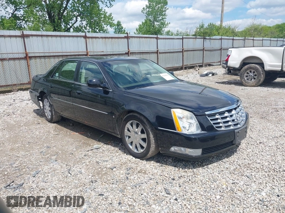 2006 Cadillac DTS 1SD z VIN 1G6KD57Y96U213474, wystawiony jako IAAI lot #42204202 z przebiegiem 102 627 mil mil oraz . Historia ofert i sprzedaży dostępna na DreamBid. Obrazek 1.