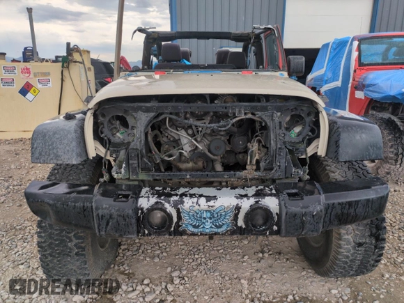 2013 Jeep Wrangler Sahara with VIN 1C4AJWBG9DL560781, listed as a Copart auction lot 61980265 with 86,436 mi miles and Salvage title. Bid and sale history available at DreamBid. Image 5.