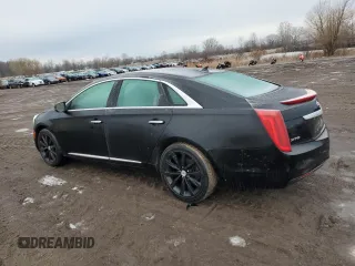 2014 Cadillac XTS with VIN 2G61L5S38E9299351, listed as a Copart auction lot 46895525 with 91,115 mi miles and Clean Title. Bid and sale history available at carsss.com. Image 2.